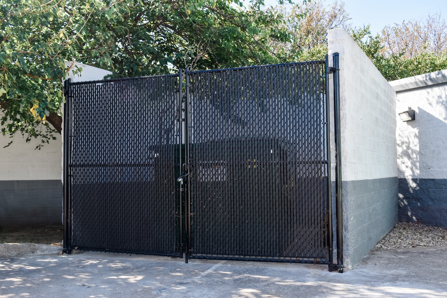 Commercial privacy slat fence by Gladiator Fence & Outdoors